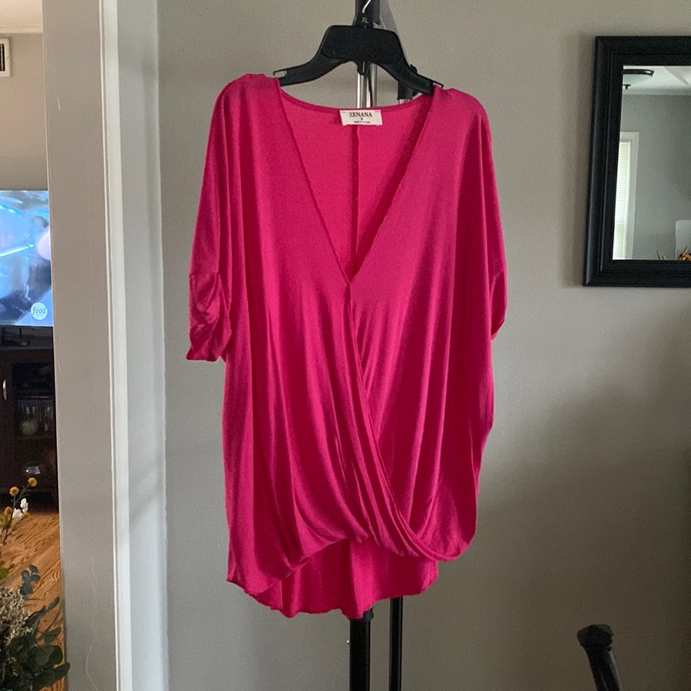 Oversized, split front, low/high hot pink shirt.